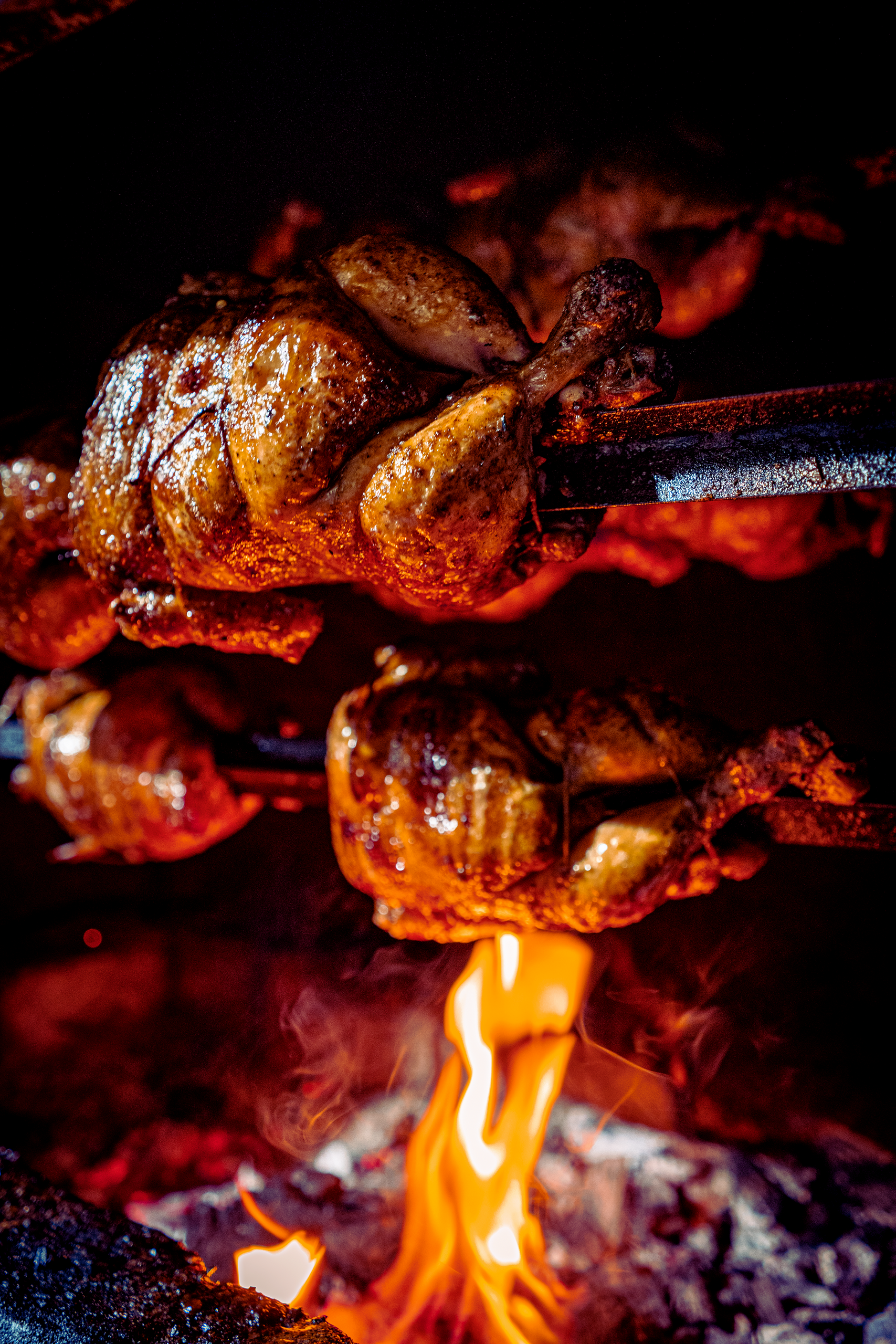 Close Up Shot of Roasted Chickens in the Rotisserie